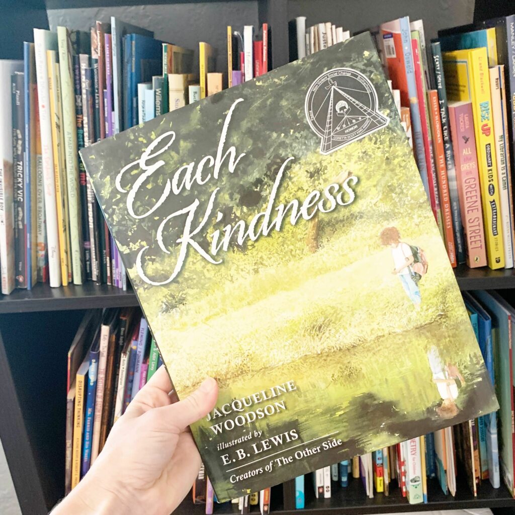 A picture of the cover Each Kindness by Jacqueline Woodson - a great picture book for teaching theme.