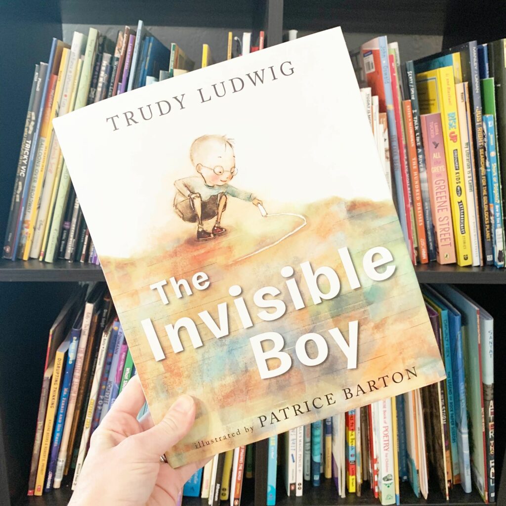 A Picture of a cover of The Invisible Boy by Trudy Ludwig - a great picture book for teaching theme.