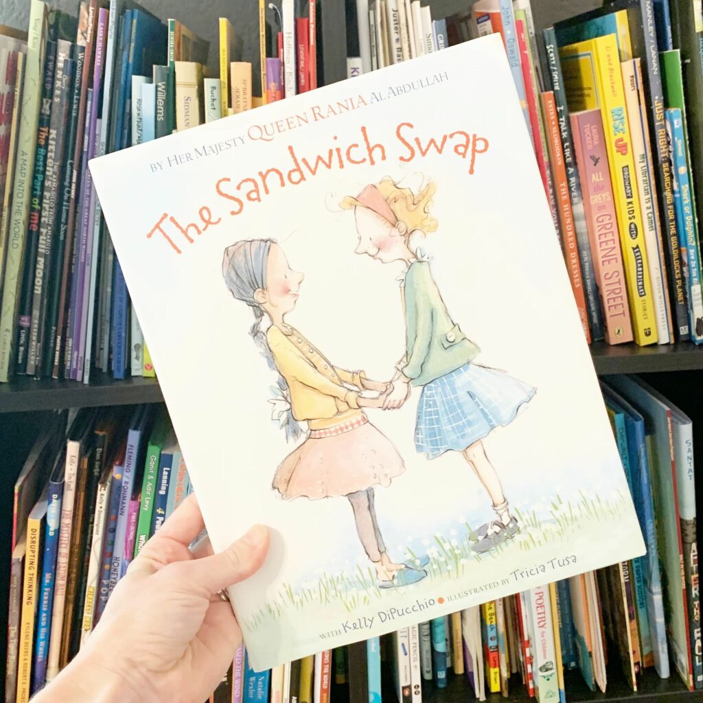 Image shows the cover of the picture book The Sandwich Shop, which is a great mentor text for teaching theme.
